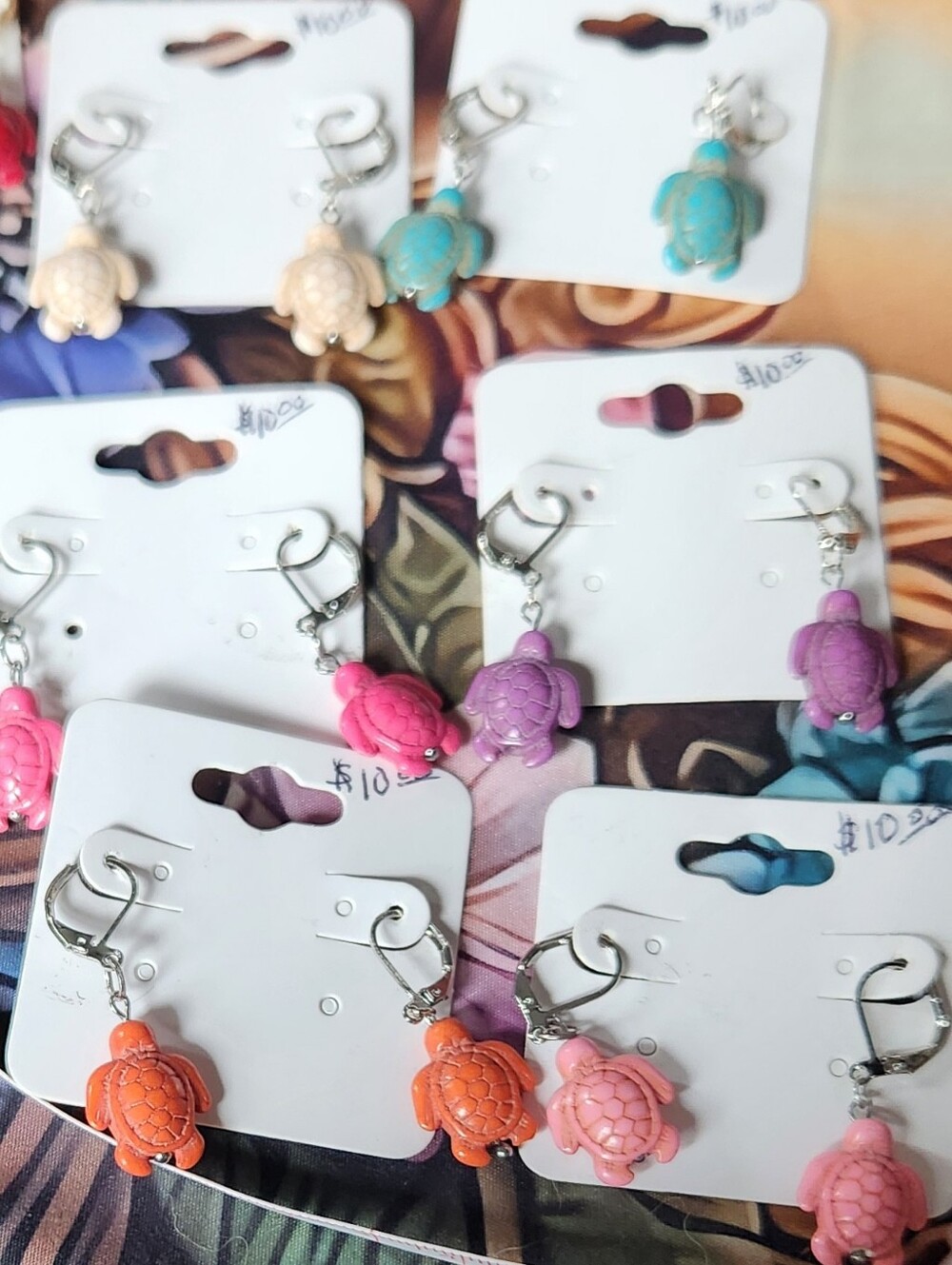 Resin Turtle Charms On Stainleee Steel Huggie (Like A Hoop) Earrings.
